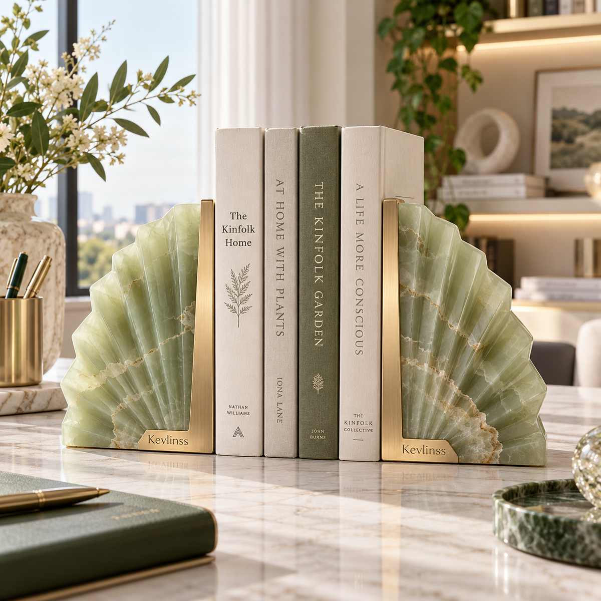 Green fan-shaped bookends with gold-tone bases